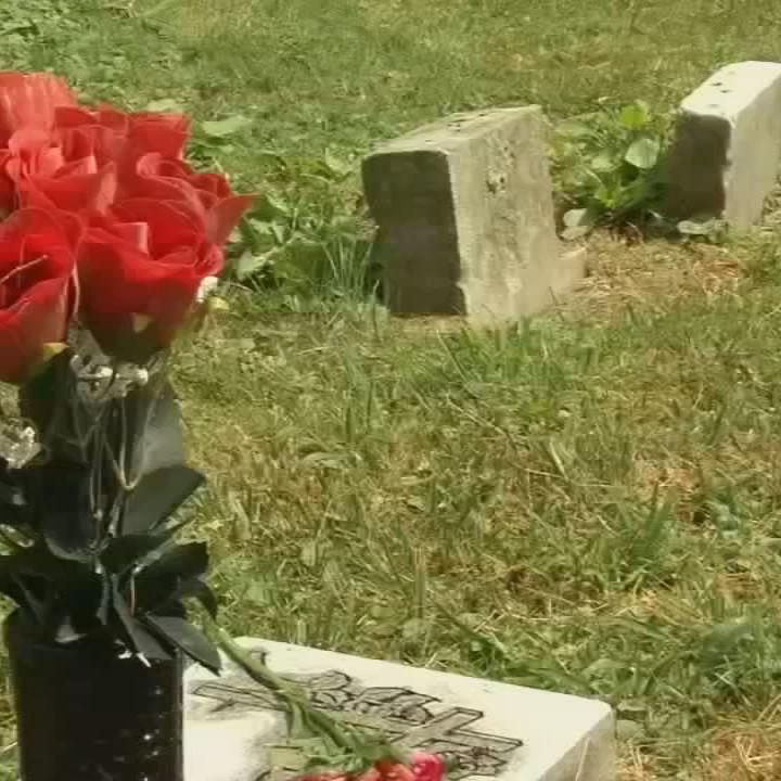 Greenwood cemetery gravestone flowers.jpg